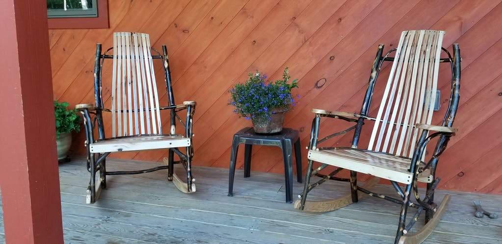 https://outdooroasisusa.com/cdn/shop/products/a-and-l-furniture-amish-bentwood-hickory-9-slat-rocking-chair-lifestyle_1024x498.jpg?v=1663207871